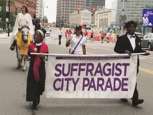 Susan B. Anthony and Frederick Douglass lead the Suffragist City Parade